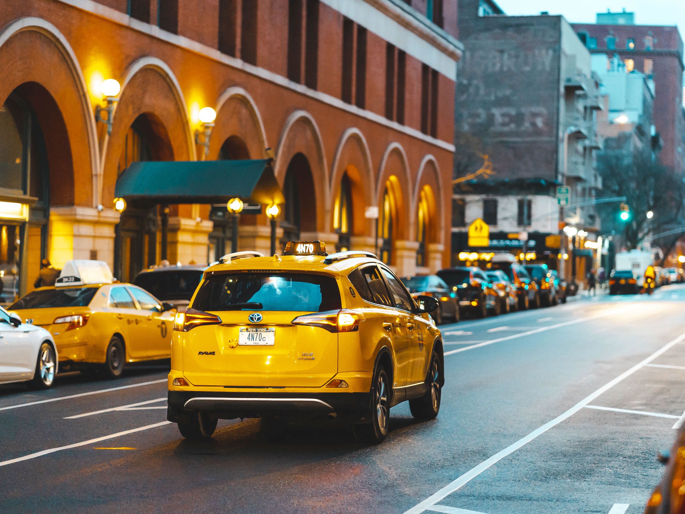 Taxi Driving Down the Street Taxi Driving Down the Street